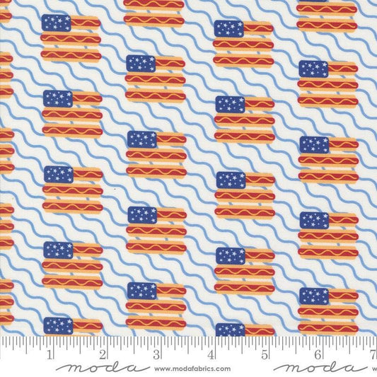 Image of the Play Ball Flags Chalk quilting cotton fabric by Moda Fabrics. Features novelty flags and hotdogs on a cream background. 
Cute Little Fabric Shop