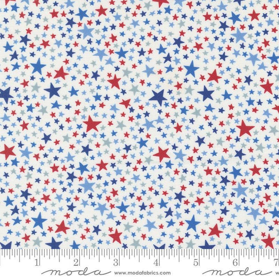 Image of the Play Ball Stars Chalk quilting cotton fabric by Moda Fabrics. Features novelty stars on a cream background. 
Cute Little Fabric Shop