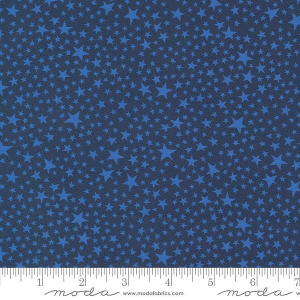 Image of the Play Ball Stars Navy quilting cotton fabric by Moda Fabrics. Features novelty stars on a blue background. 
Cute Little Fabric Shop