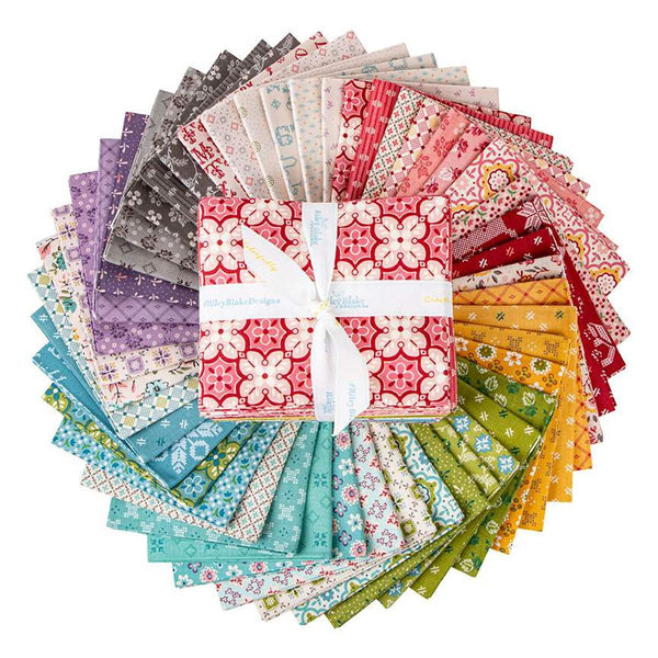 Image of the Piece and Plenty Fat Quarter Bundle by Lori Holt for Riley Blake Designs. Features many colors of fabrics with various patterns. 
Cute Little Fabric Shop