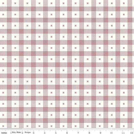Image of the Red Delicious Candy Apple Cloud quilting cotton fabric by Riley Blake Designs. Features a red and white dotted plaid pattern on a cream background. 
Cute Little Fabric Shop