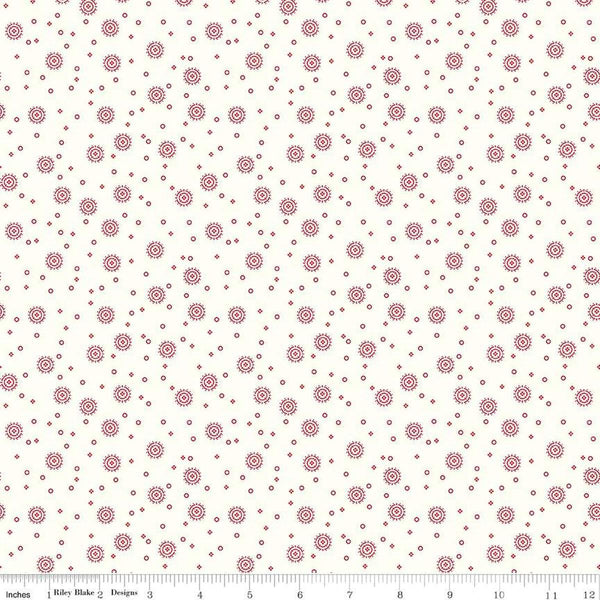 Image of the Red Delicious Cherry Soda Cloud quilting cotton fabric by Riley Blake Designs. Features scattered blossoms and circles on a cream background. 
Cute Little Fabric Shop