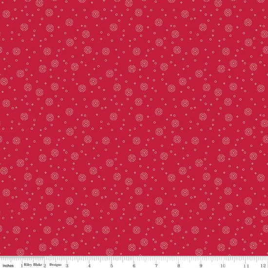 Image of the Red Delicious Cherry Soda Berry quilting cotton fabric by Riley Blake Designs. Features scattered blossoms and circles on a berry background. 
Cute Little Fabric Shop