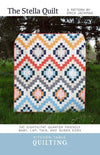 Image of The Stella Quilt Quilt Pattern by Kitchen Table Quilting for Riley Blake Designs. Features a diamond quilt pattern. 
Cute Little Fabric Shop