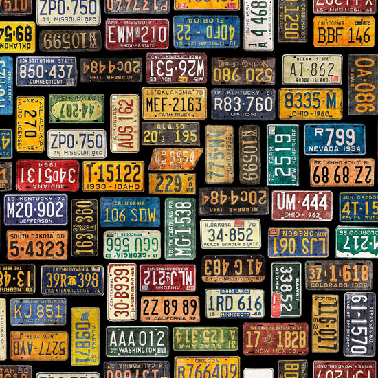 Image of the Heavy Metal License Plates Black J quilting cotton fabric by Morris Creative Group for QT Fabrics. Features small license plates on a black background. 
Cute Little Fabric Shop