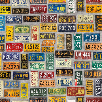 Image of the Heavy Metal License Plates Gray K quilting cotton fabric by Morris Creative Group for QT Fabrics. Features small license plates on a gray background. 
Cute Little Fabric Shop