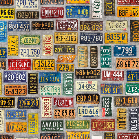 Image of the Heavy Metal License Plates Gray K quilting cotton fabric by Morris Creative Group for QT Fabrics. Features small license plates on a gray background. 
Cute Little Fabric Shop