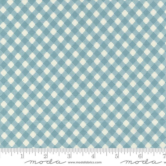 Image of the Farmstead Gingham Mountain Stream quilting cotton fabric by Stacy Iest Hsu for Moda Fabrics. Features printed diagonal gingham on a denim blue background. 
Cute Little Fabric Shop