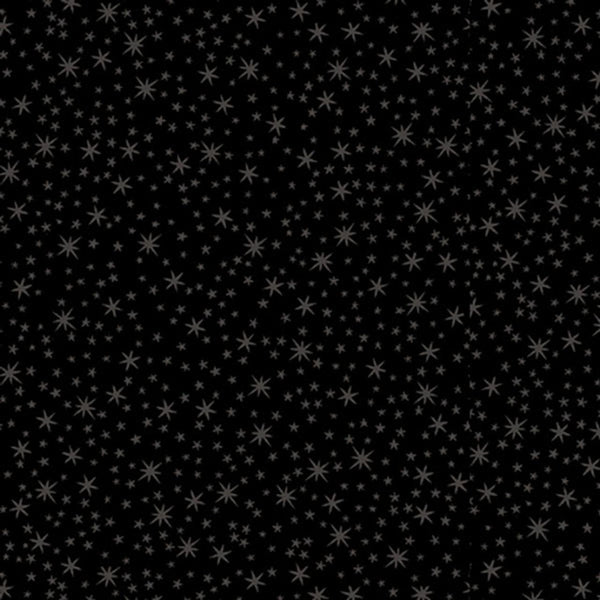 Image of the Quilting Illusions Stars Black quilting cotton fabric by QT Fabrics. Features stars on a black background. 
Cute Little Fabric Shop