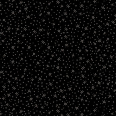 Image of the Quilting Illusions Stars Black quilting cotton fabric by QT Fabrics. Features stars on a black background. 
Cute Little Fabric Shop