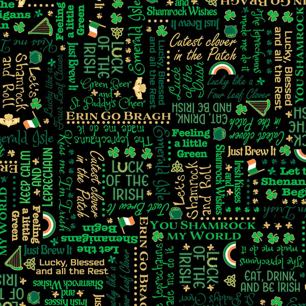 Image of the St. Paddy&#39;s Cheer Irish Lingo quilting cotton fabric by QT Fabrics. Features green text on a black background. 
Cute Little Fabric Shop.
