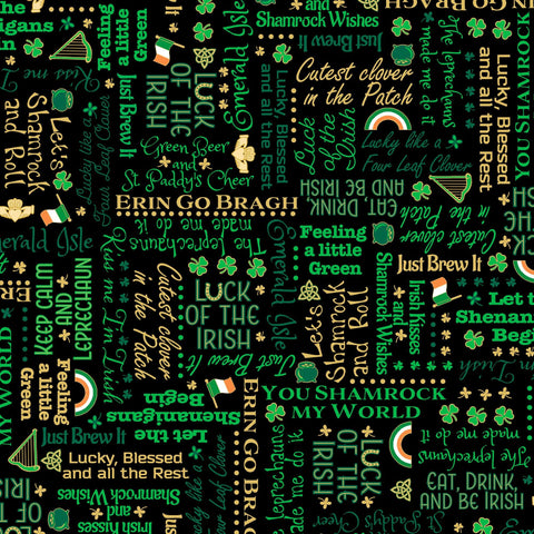 Image of the St. Paddy&#39;s Cheer Irish Lingo quilting cotton fabric by QT Fabrics. Features green text on a black background. 
Cute Little Fabric Shop.