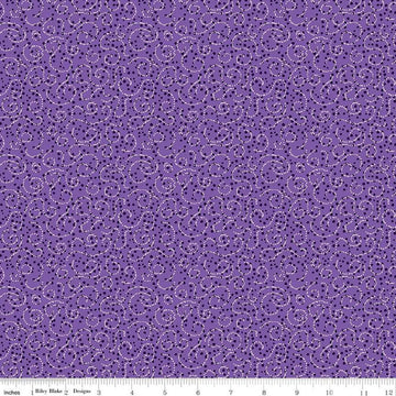Image of the Plum Petals Swirl Violet quilting cotton fabric by Diane Labombarbe for Riley Blake Designs. Features dotted swirls on a purple background. Cute Little Fabric Shop