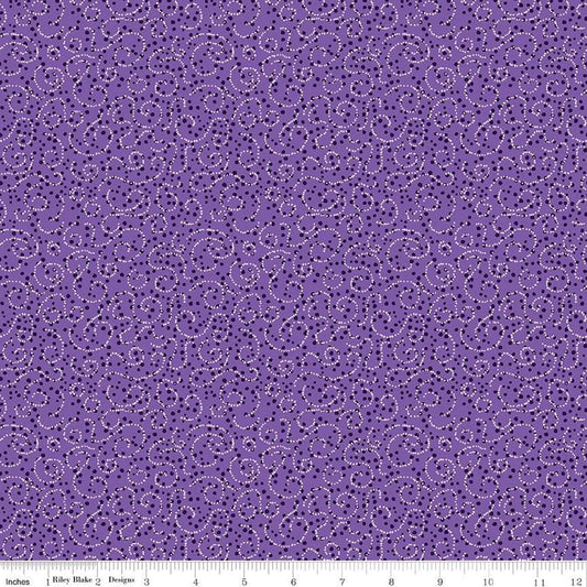 Image of the Plum Petals Swirl Violet quilting cotton fabric by Diane Labombarbe for Riley Blake Designs. Features dotted swirls on a purple background. Cute Little Fabric Shop