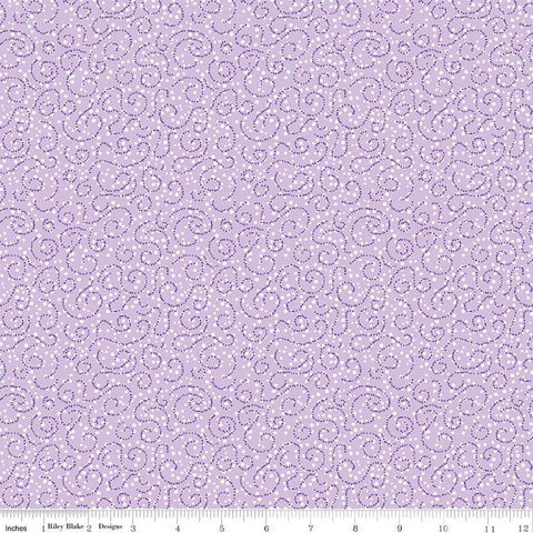 Image of the Plum Petals Swirl Lilac quilting cotton fabric by Diane Labombarbe for Riley Blake Designs. Features dotted swirls on a purple background. Cute Little Fabric Shop