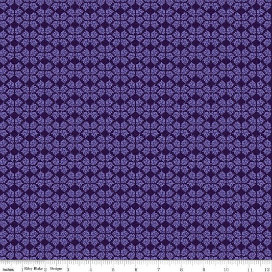 Image of the Plum Petals Geometric Purple quilting cotton fabric by Diane Labombarbe for Riley Blake Designs. Features geometric flowers on a purple background. Cute Little Fabric Shop