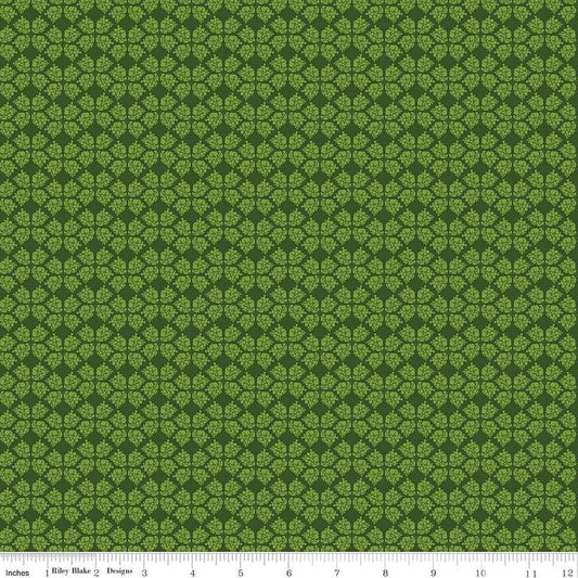 Image of the Plum Petals Geometric Green quilting cotton fabric by Diane Labombarbe for Riley Blake Designs. Features geometric flowers on a green background. Cute Little Fabric Shop