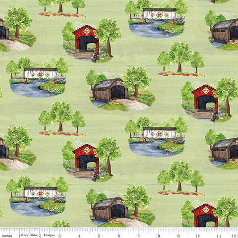 Image of the Covered Bridges in Spring Main Green by Quilting Cotton Fabric. Features covered bridges on a green background. Cute Little Fabric Shop