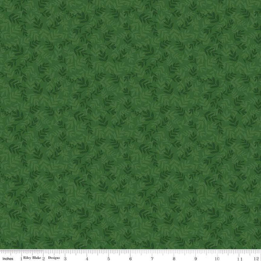 Image of the Covered Bridges in Spring Leaves Green by Quilting Cotton Fabric. Features tone on tone stems on a green background. Cute Little Fabric Shop