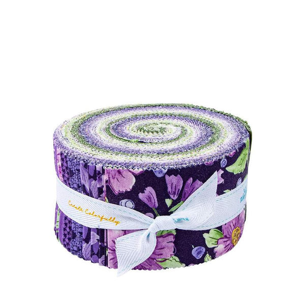 Image of the Plum Petals Rolie Polie by Diane Labombarbe for Riley Blake Designs. Features flowers on various backgrounds. 
Cute Little Fabric Shop