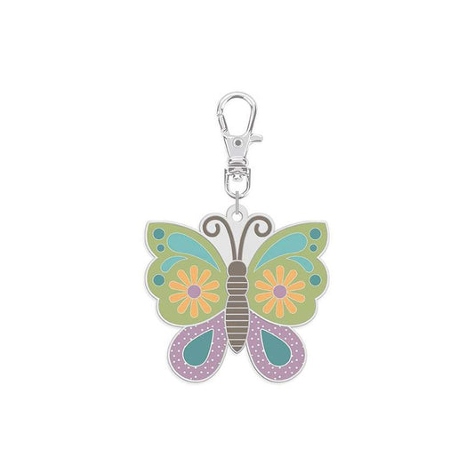 Features the Enamel Happy Charm™ Butterfly by Lori Holt for Riley Blake Designs. Features a butterfly charm. 
Cute Little Fabric Shop