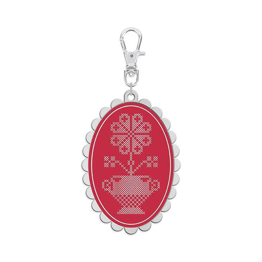 Features the Enamel Happy Charm™ Cross Stitch by Lori Holt for Riley Blake Designs. Features a  floral cross stitch charm. 
Cute Little Fabric Shop