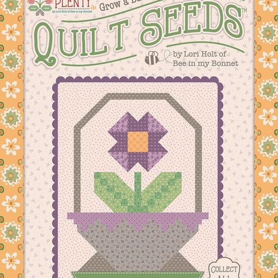Image of the  Piece & Plenty Quilt Seeds™ Flower Basket No. 1 quilt pattern by Lori Holt for Riley Blake Designs. Features a purple flower on a quilt. 
Cute Little Fabric Shop