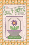 Image of the  Piece & Plenty Quilt Seeds™ Flower Basket No. 1 quilt pattern by Lori Holt for Riley Blake Designs. Features a purple flower on a quilt. 
Cute Little Fabric Shop