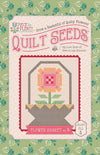 Image of the  Piece & Plenty Quilt Seeds™ Flower Basket No. 4 quilt pattern by Lori Holt for Riley Blake Designs. Features a pink flower on a quilt. 
Cute Little Fabric Shop
