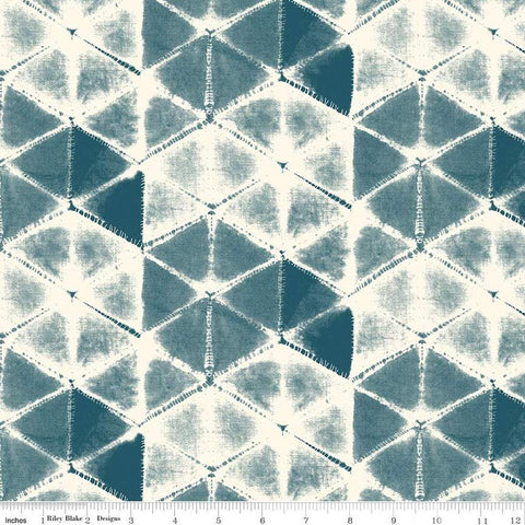 Image of the Wide Back Eden Shibori Stargazer quilting cotton fabric by Gabrielle Neil Design for Riley Blake Designs. Features a geometric fabric on a blue background. 
Cute Little Fabric Shop