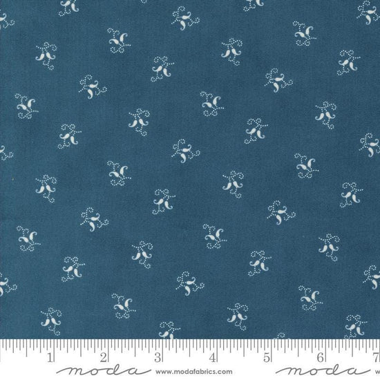 Image of the Sandalwood Felicity Indigo quilting cotton fabric by 3 Sisters for Moda Fabrics. Features a floral fabric on a blue background. Cute Little Fabric Shop