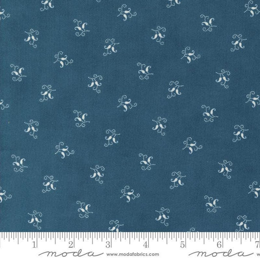 Image of the Sandalwood Felicity Indigo quilting cotton fabric by 3 Sisters for Moda Fabrics. Features a floral fabric on a blue background. Cute Little Fabric Shop