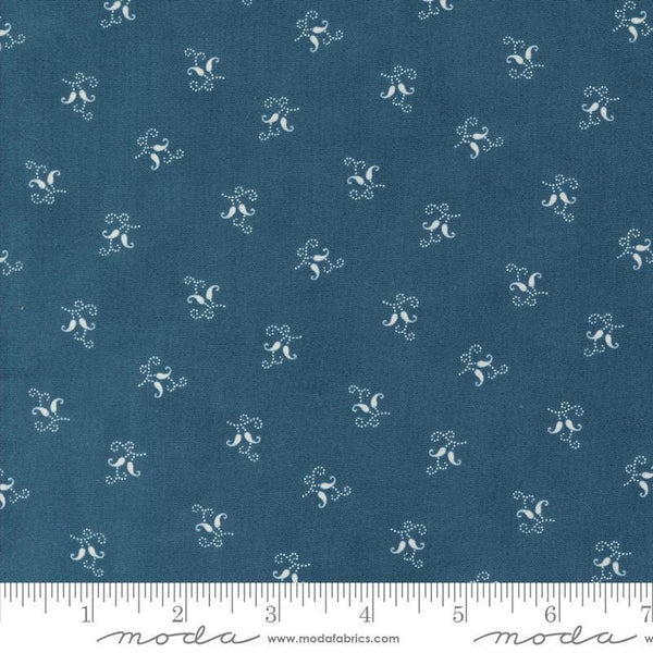 Image of the Sandalwood Felicity Indigo quilting cotton fabric by 3 Sisters for Moda Fabrics. Features a floral fabric on a blue background. Cute Little Fabric Shop
