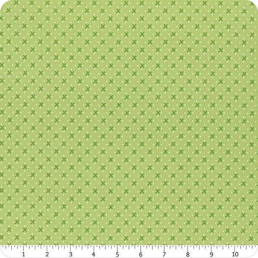 Image of the Granny Chic Green Kisses quilting cotton fabric by Lori Holt for Riley Blake Designs. Features Xs on a green background. 
Cute Little Fabric Shop