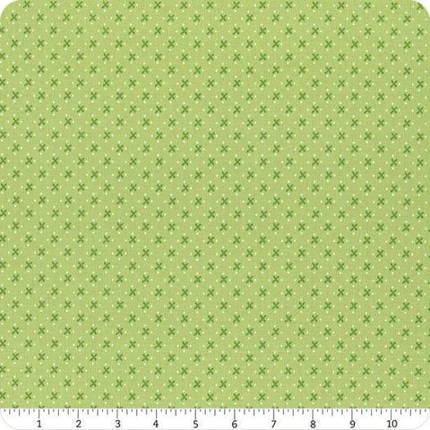 Image of the Granny Chic Green Kisses quilting cotton fabric by Lori Holt for Riley Blake Designs. Features Xs on a green background. 
Cute Little Fabric Shop