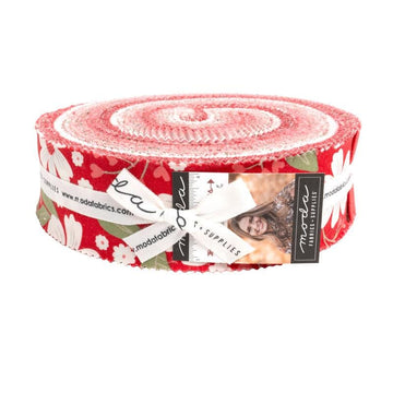 Image of the Love Blooms Honey Bun by Moda Fabrics. Features valentine's day themed fabrics. 
Cute Little Fabric Shop