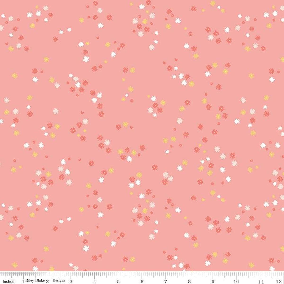 Image of the Between the Pages Flowers Coral quilting cotton fabric by Fran Gulick for Riley Blake Designs. Features scattered small flowers on a pink background. 
Cute Little Fabric Shop