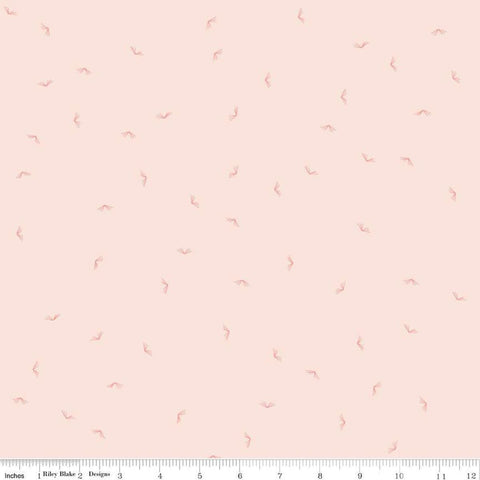 Image of the Between the Pages Open Book Ballerina
 quilting cotton fabric by Fran Gulick for Riley Blake Designs. Features scattered books on a light pink background. 
Cute Little Fabric Shop