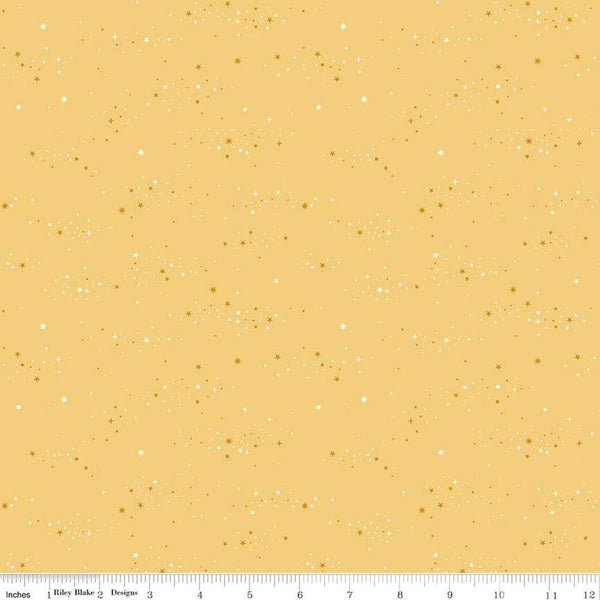 Image of the Between the Pages Starlight Honey quilting cotton fabric by Fran Gulick for Riley Blake Designs. Features small scattered stars on a light yellow background. 
Cute Little Fabric Shop