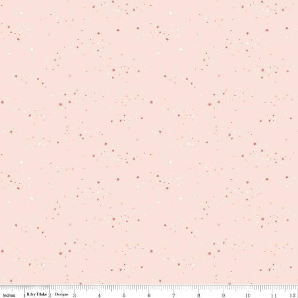 Image of the Between the Pages Starlight Ballerina quilting cotton fabric by Fran Gulick for Riley Blake Designs. Features small scattered stars on a light pink background. 
Cute Little Fabric Shop
