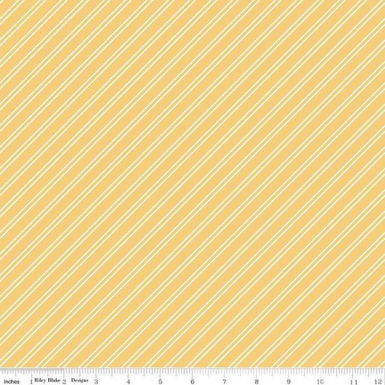 Image of the Between the Pages Stripes Honey quilting cotton fabric by Fran Gulick for Riley Blake Designs. Features diagonal small stripes on a light yellow background. 
Cute Little Fabric Shop