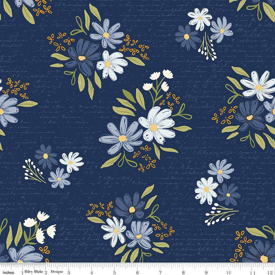 Image of the Between the Pages Main Navy quilting cotton fabric by Fran Gulick for Riley Blake Designs. Features clusters of flowers and tone-on-tone text on a navy background. 
Cute Little Fabric Shop