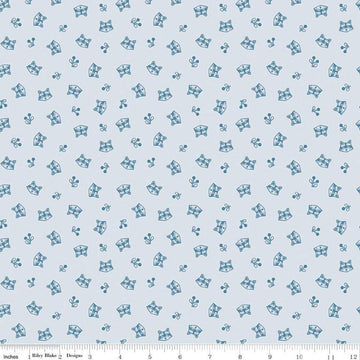 Image of the Twilight Creatures Raccoons Ice
 quilting cotton fabric by Natàlia Juan Abelló for Riley Blake Designs. Features scattered sprigs and raccoon heads on a pale blue background. 
Cute Little Fabric Shop