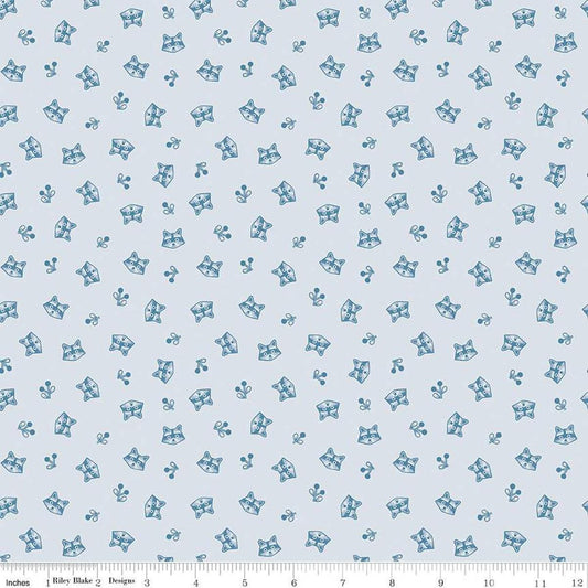 Image of the Twilight Creatures Raccoons Ice
 quilting cotton fabric by Natàlia Juan Abelló for Riley Blake Designs. Features scattered sprigs and raccoon heads on a pale blue background. 
Cute Little Fabric Shop