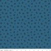 Image of the Twilight Creatures Raccoons Blue
 quilting cotton fabric by Natàlia Juan Abelló for Riley Blake Designs. Features scattered sprigs and raccoon heads on a dark blue background. 
Cute Little Fabric Shop
