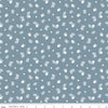 Image of the Twilight Creatures Happy Acorns Storm quilting cotton fabric by Natàlia Juan Abelló for Riley Blake Designs. Features small scattered acorns, stars, and leaves on a gray blue background. 
Cute Little Fabric Shop