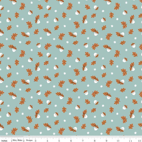 Image of the Twilight Creatures Happy Acorns Songbird quilting cotton fabric by Natàlia Juan Abelló for Riley Blake Designs. Features small scattered acorns, stars, and leaves on a light aqua green background. 
Cute Little Fabric Shop
