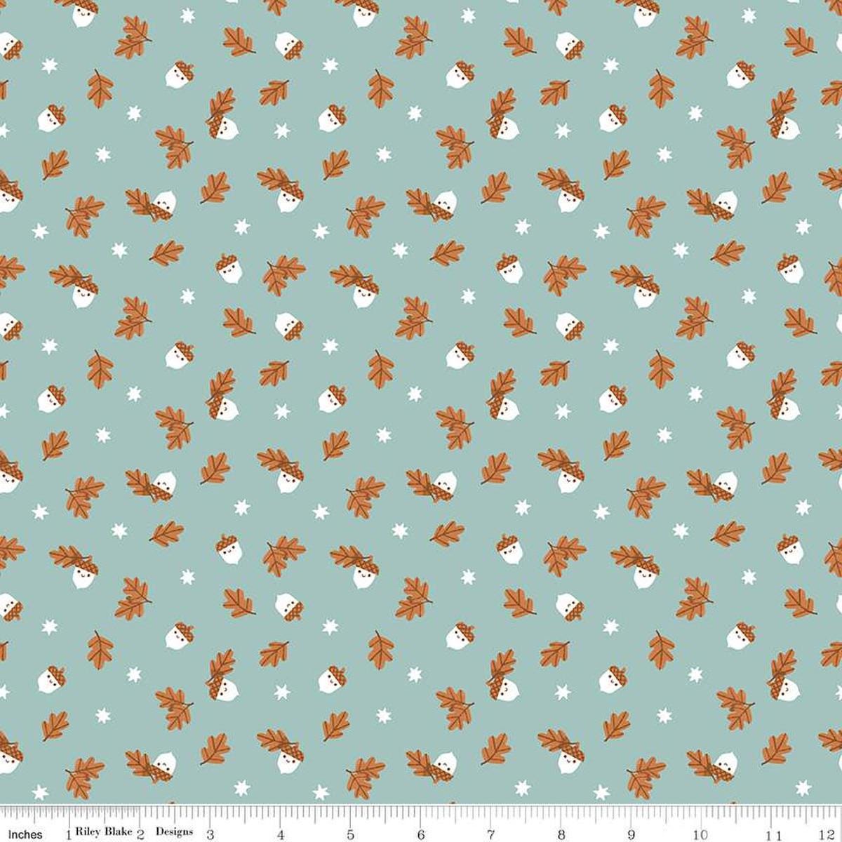 Image of the Twilight Creatures Happy Acorns Songbird quilting cotton fabric by Natàlia Juan Abelló for Riley Blake Designs. Features small scattered acorns, stars, and leaves on a light aqua green background. 
Cute Little Fabric Shop