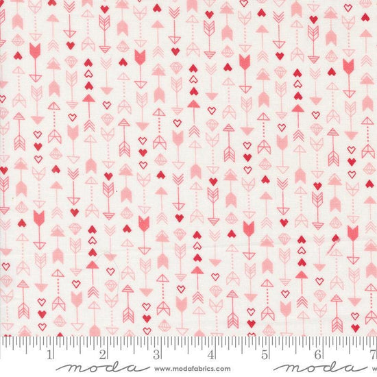 Image of the Love Blooms Arrow Lace quilting cotton fabric by Moda Fabrics. Features arrows on a white background. Cute Little Fabric Shop