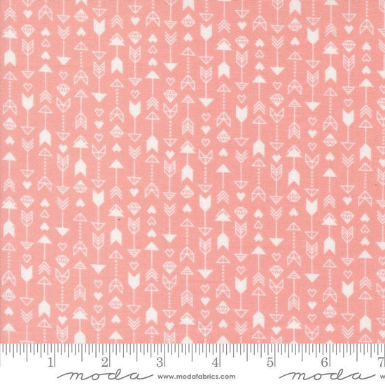 Image of the Love Blooms Arrow Blush quilting cotton fabric by Moda Fabrics. Features arrows on a pink background. Cute Little Fabric Shop